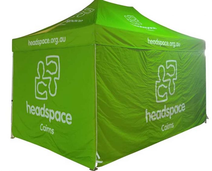 green custom marquee with the headspace logo on it