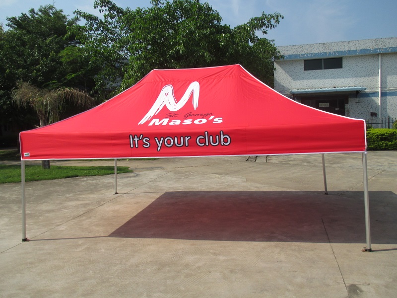 red custom marquee with a maso's logo on it