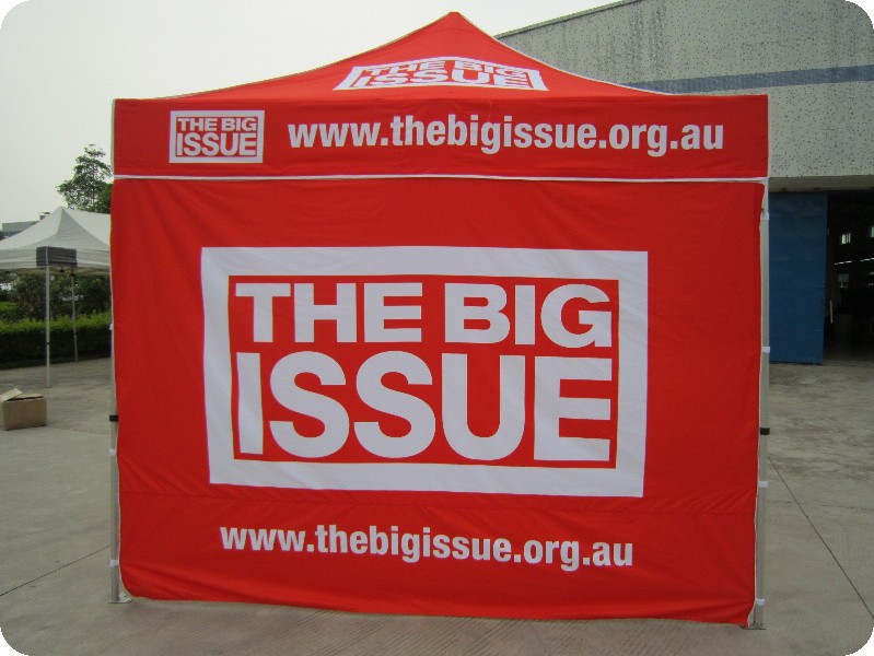 big red custom marquee with the words the big issue on it