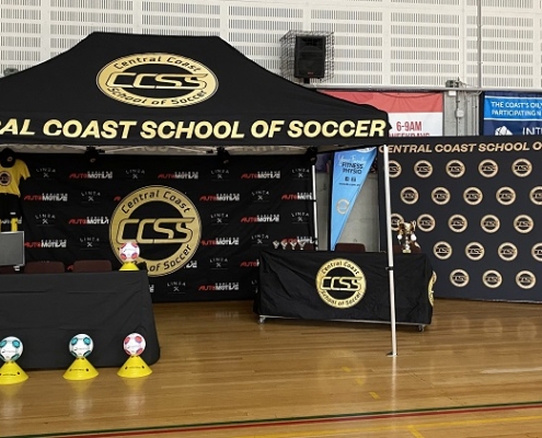 school of soccer custom marquee et up on a basketball court