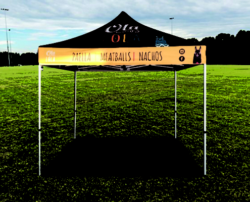 custom marquee in the middle of a grassy field
