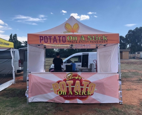 custom marquee with a sign that says potato on a stick