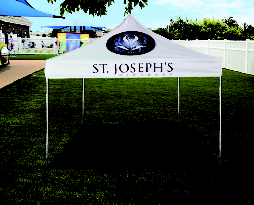 white custom marquee with a st joseph's logo on it