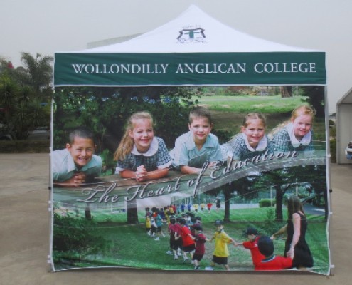 custom marquee with a picture of children on it